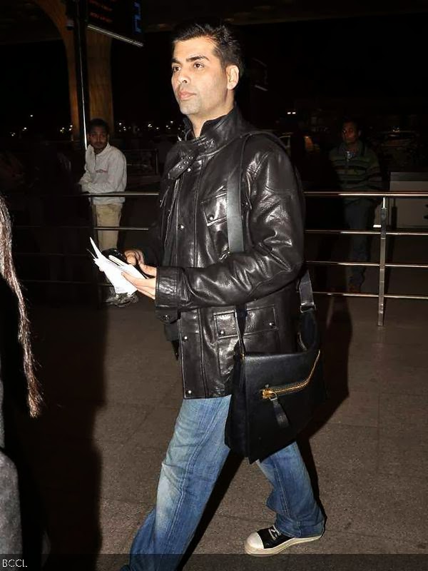 Karan Johar seen at Mumbai airport, on February 16, 2014. (Pic: Viral Bhayani)