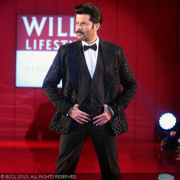 Anil Kapoor flaunts a creation by fashion designer Ashish N Soni during the grand finale of the Wills Lifestyle India Fashion Week (WIFW) Spring/Summer 2014, held in Delhi.