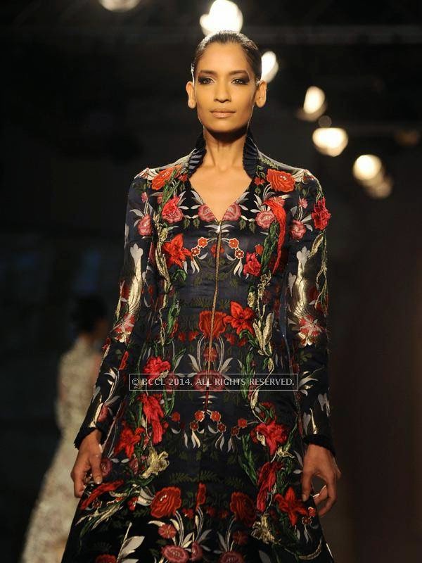 Krishna Somani showcases a creation by designer Gaurab Gupta on Day 3 of India Couture Week, 2014, held at Taj Palace hotel, New Delhi.