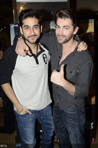 Vinay Virmani and Neil Nitin Mukesh having a blast during the premiere of the movie 'David', held in Mumbai on January 31, 2013. (Pic: Viral Bhayani)<br /> 