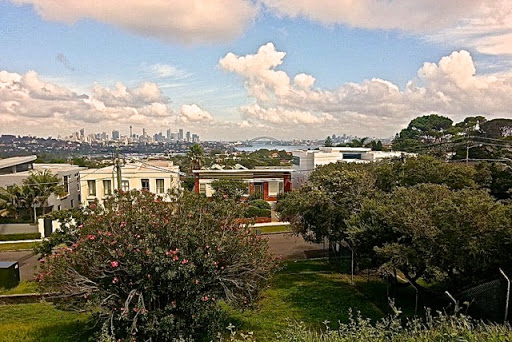 Glimpses of Sydney harbour from the road. From Walking Sydney: North Bondi to South Head