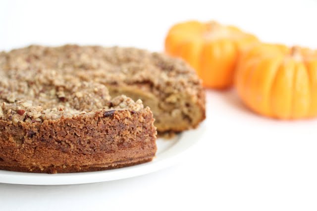 photo of a pumpkin coffee cake with a slice removed