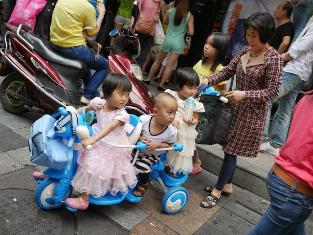 a three child stroller