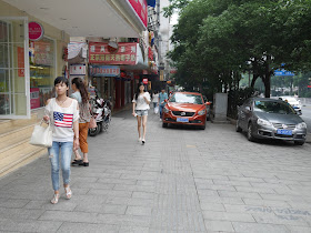 woman wearing shirt with an image similar to the US flag