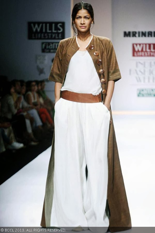 Carol Gracias showcases a creation by fashion designer Mrinalini on Day 3 of Wills Lifestyle India Fashion Week (WIFW) Spring/Summer 2014, held in Delhi.
