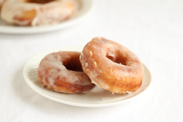 photo of two donuts on a plate