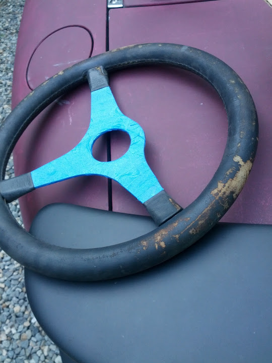 My reupholstering of a steering wheel...