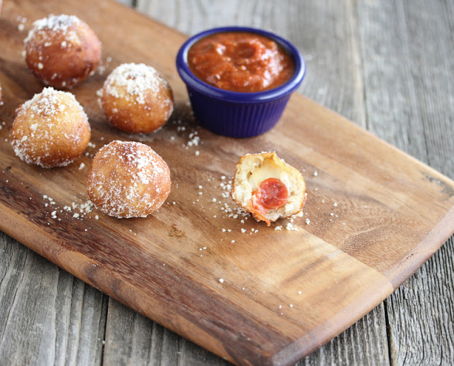 Fried Pizza Balls on a cutting board