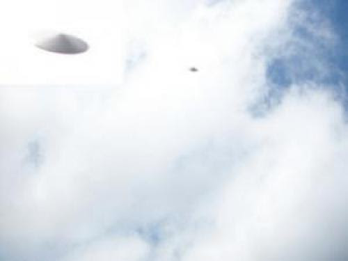 Silver Disc Shaped Ufo Photographed Over England