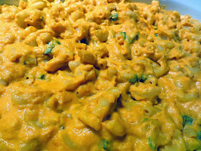 Pumpkin Mac and Cheese Recipe: After making the cheese sauce, stir it into the pasta until well mixed, then pour into a baking dish