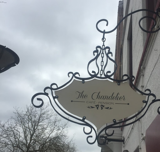 Café Pension The Chandelier logo
