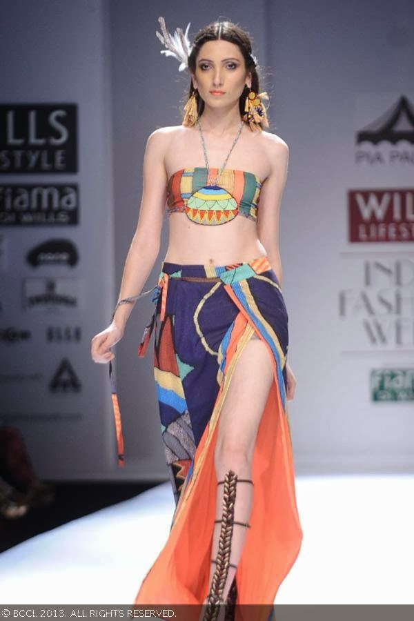 A model walks the ramp for fashion designer Pia Pauro on Day 2 of the Wills Lifestyle India Fashion Week (WIFW) Spring/Summer 2014, held in Delhi.