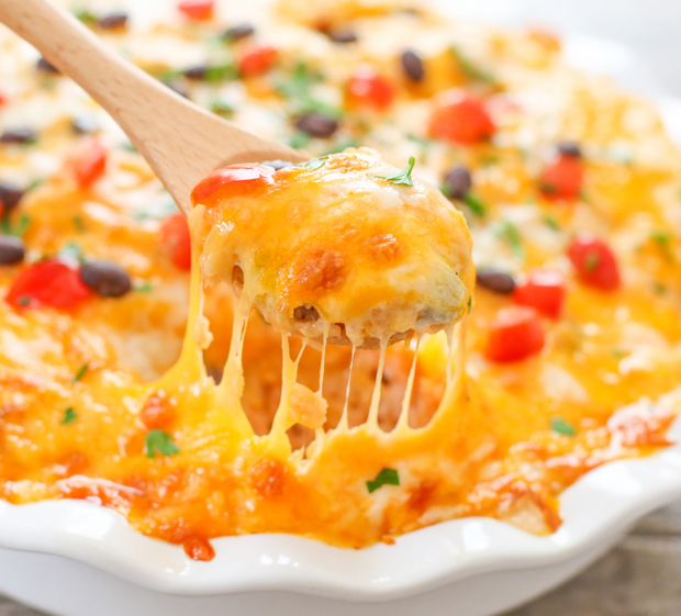 photo of a spoonful of Enchilada Rice Casserole