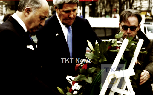 Ngoại trưởng Mỹ tới hiện trường tàn sát ở Paris viếng các nạn nhân - 1