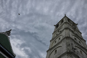 bird flying above the Kampung Kling Mosque