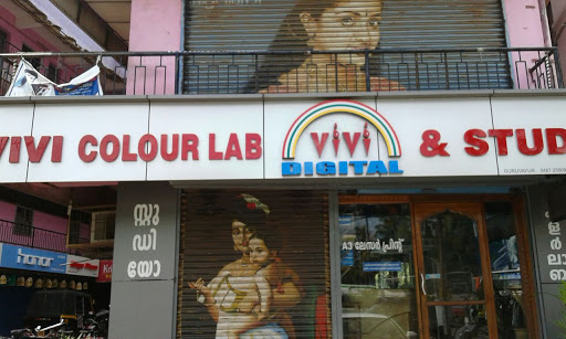 Vivi Digital Colour Lab & Studio, Krishnanjali Building, Guruvayoor, Thrissur, Kerala 680101, India, Photographer, state KL