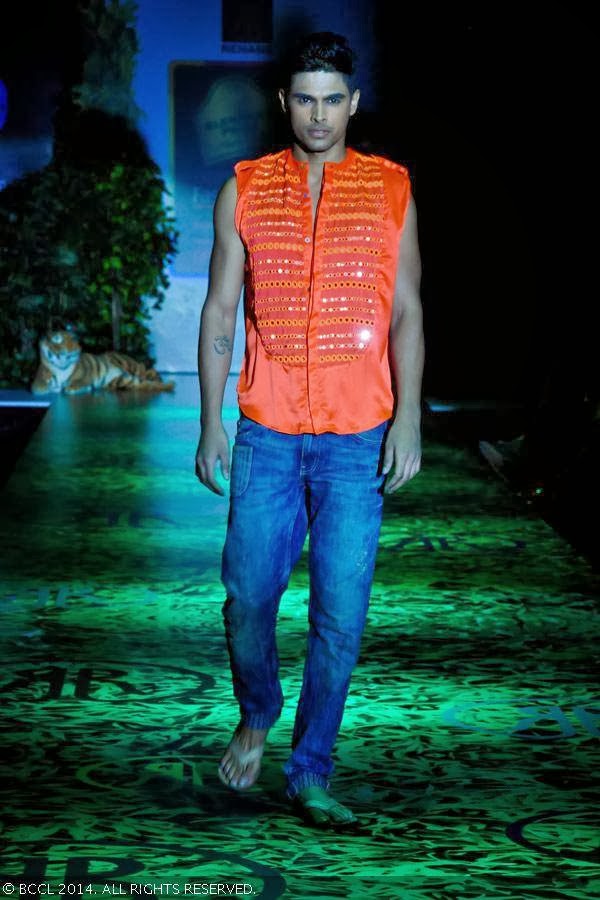 A model walks the ramp in a Rehane creation during Blenders Pride Bangalore Fashion Week.<br /> 