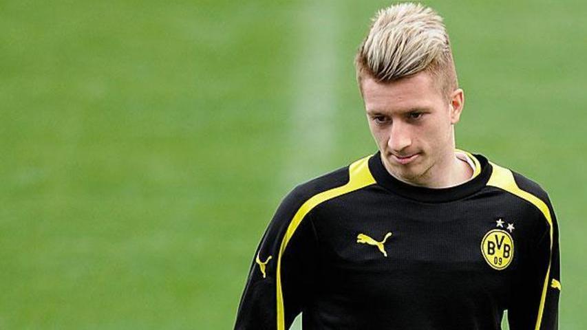 Trông Marco Reus trở nên bụi bặm hơn với kiểu tóc mào gà