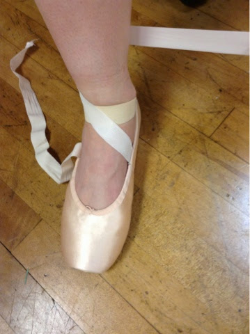 tying pointe shoes