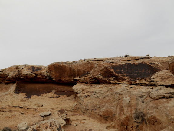 Both petroglyph panels (the one on the left is difficult to make out)