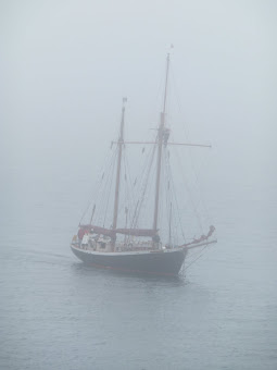 J-Class yacht lurking in the fog