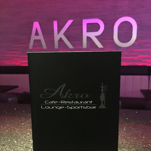 AKRO Cafe Restaurant Lounge Sportsbar logo