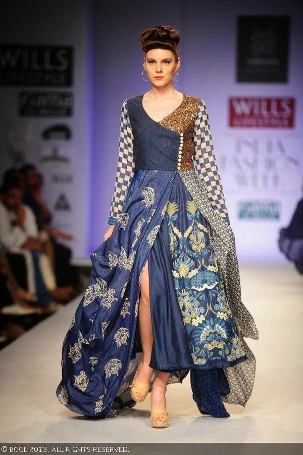 A model showcases a creation by fashion designers Ashish Viral and Vikrant on Day 5 of Wills Lifestyle India Fashion Week (WIFW) Spring/Summer 2014, held in Delhi.