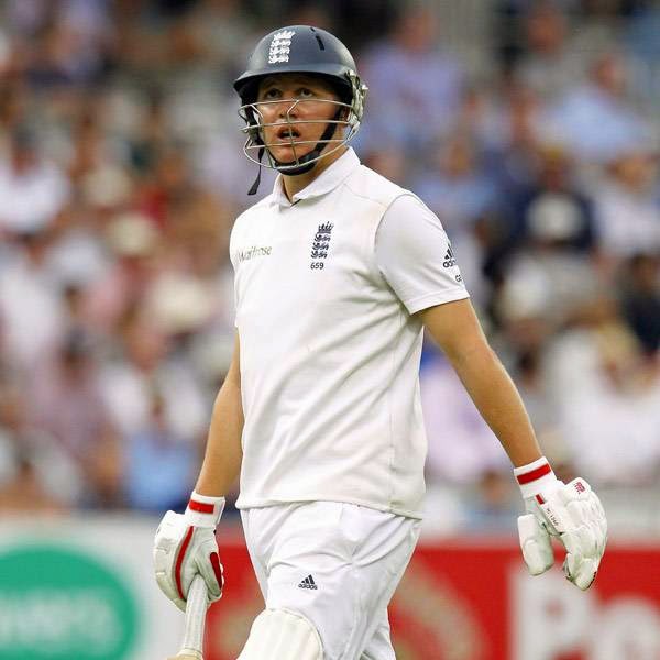 England's Gary Ballance walks back to the pavilion after getting out for 27 runs during play on the fourth day of the second cricket Test match between England and India at Lord's cricket ground in London on July 20, 2014.