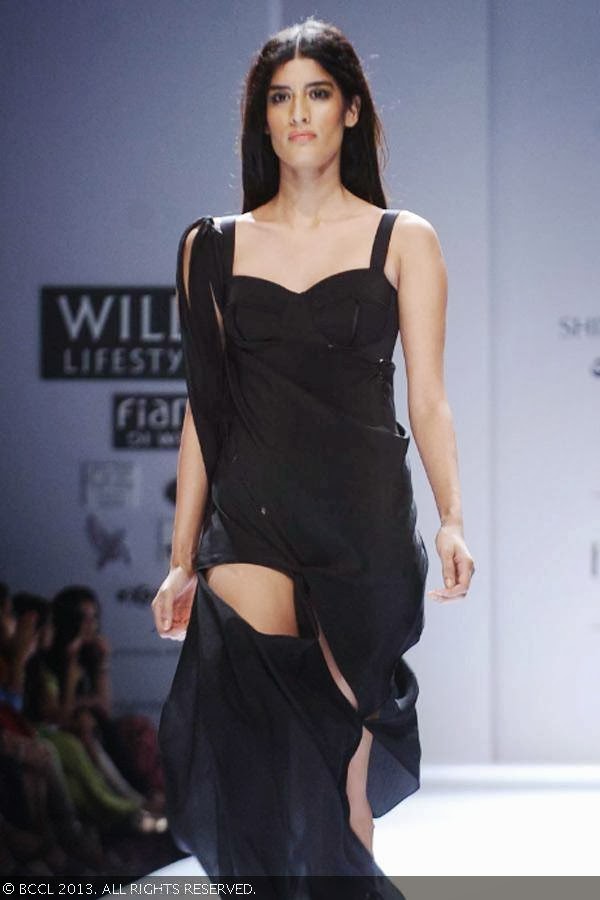 Erika showcase a creation by fashion designers Shivan & Narresh on Day 2 of Wills Lifestyle India Fashion Week (WIFW) Spring/Summer 2014, held in Delhi.