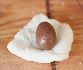 process photo showing the cadbury egg on a piece of dough