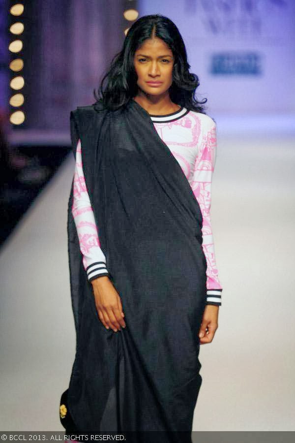Carol Gracias showcases a creation by fashion designer Masaba on Day 1 of Wills Lifestyle India Fashion Week (WIFW) Spring/Summer 2014, held in Delhi.