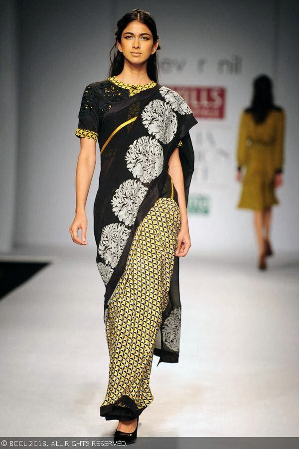 A model flaunts a creation by fashion designers Dev r Nil on Day 3 of Wills Lifestyle India Fashion Week (WIFW) Spring/Summer 2014, held in Delhi.