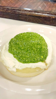 Crumpet Shop crumpet with ricotta and pesto in Seattle, by Pike Place Market