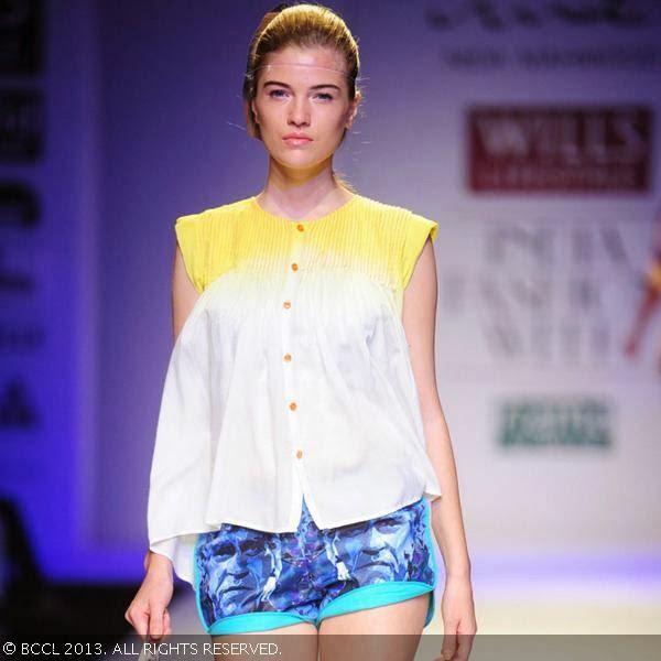 Polina showcases a creation by fashion designer Nida Mahmood on Day 1 of the Wills Lifestyle India Fashion Week (WIFW) Spring/Summer 2014, held in Delhi.