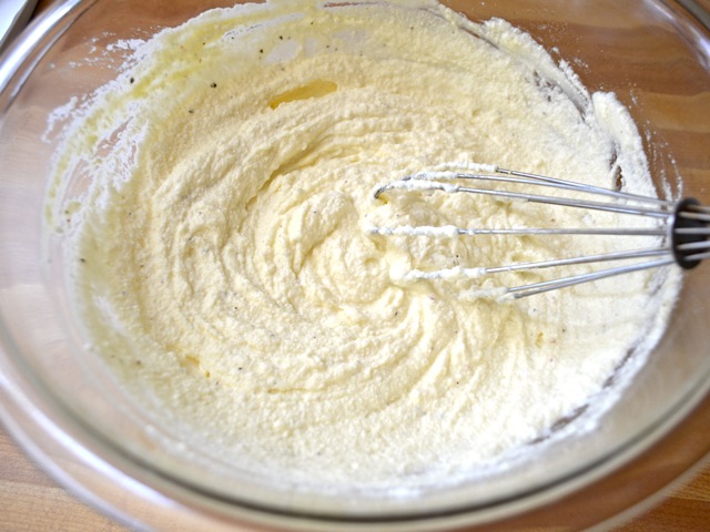 whisked ingredients in mixing bowl with whisk 