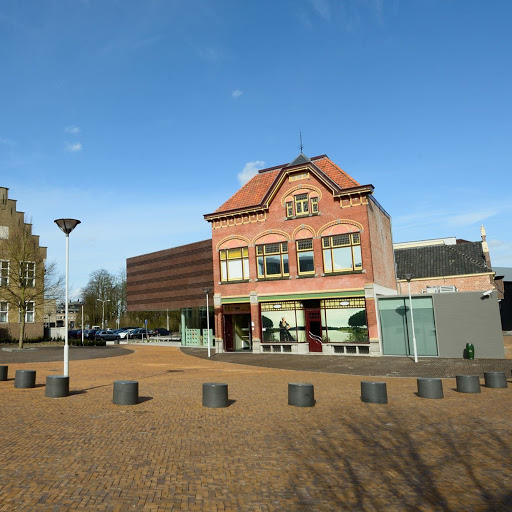 Het Warenhuis museum het land van Axel logo