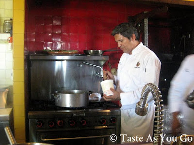 Chef Enrique Silva Spoons Ricotta Cheese on the Zucchini Colash at Los Tamarindos in Los Cabos, Mexico - Photo by Taste As You Go