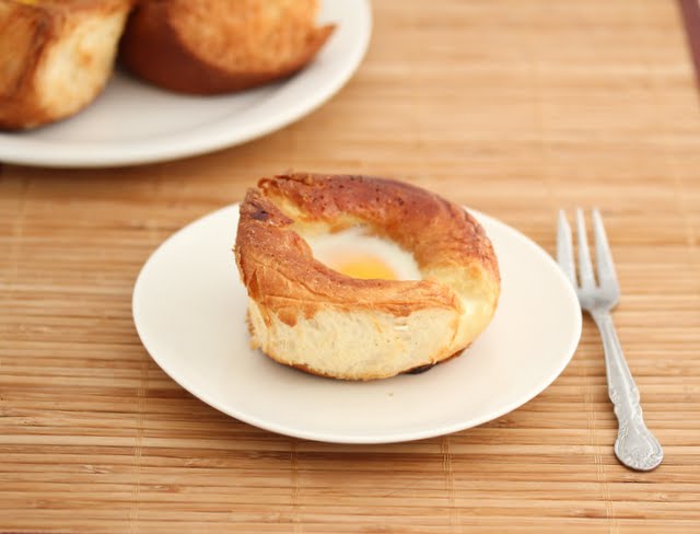 photo of an egg in a roll on a plate