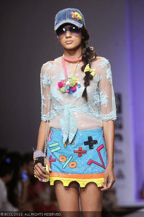 A model showcases a creation by fashion designer Niharika Pandey on Day 4 of Wills Lifestyle India Fashion Week (WIFW) Spring/Summer 2014, held in Delhi.
