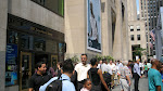 The crowded walkway in front of the entrance to 30 Rock.