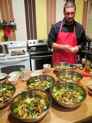Farmers Revival Dave preparing the Indian Inspired Salads