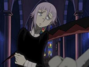 Crona: A non-gendered person with purple hair wearing a long black dress, head tilted to the side. A scythe is in front of hir.