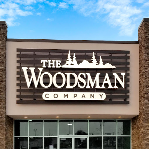 The Woodsman Company logo