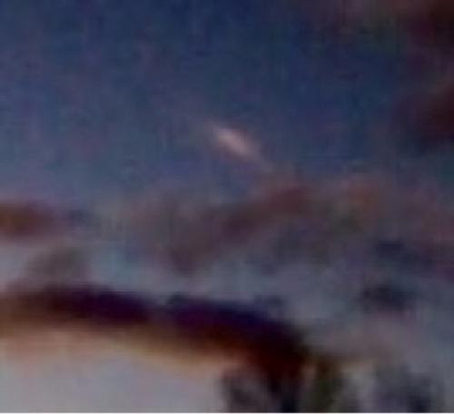 Silver Ufo Shoots Out Of A Cloud In North Carolina