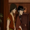 Mai and Zuko walking together at a party.