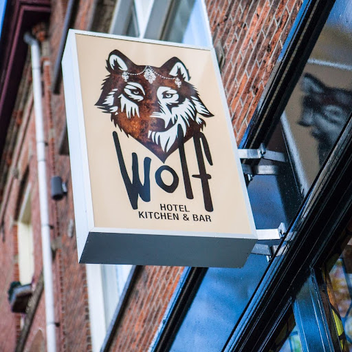 Wolf Hotel Kitchen & Bar logo