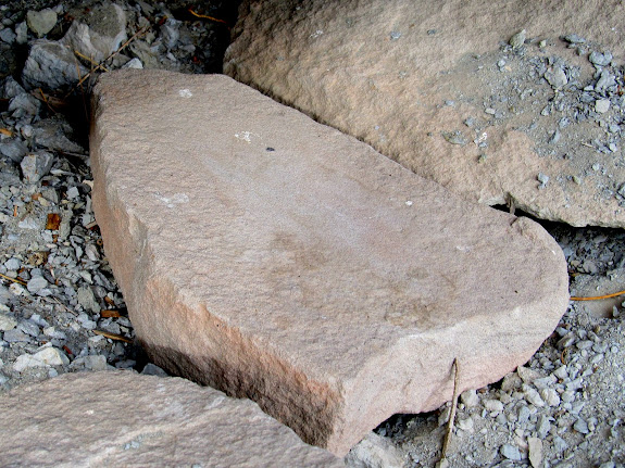 Grinding stone below some rock art