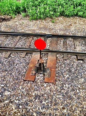 red signal train tracks rails mulch stock photo red signal train tracks rails mulch stock photo
