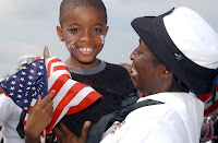 030613-N-6607P-005  Naval Station Norfolk, Va. (Jun. 13, 2003) -- A Sailor from the amphibious command and control ship USS Mount Whitney (LCC/JCC 20) rejoices after being reunited with her family during the ship's homecoming celebrations.  Mount Whitney completed a seven-month deployment as the flagship of Commander, Joint Task Force – Horn of Africa (CJTF-HOA).  The most sophisticated command, control, communications, computer and intelligence (C4I) ship ever commissioned, Mount Whitney incorporates various elements of the most advanced C4I equipment available today.  Mount Whitney departed Nov. 12, 2002, in support of the ongoing war on terrorism and Operation Enduring Freedom.  US Navy Photo by Photographer's Mate 3rd Class Delia Pettit. (RELEASE) 