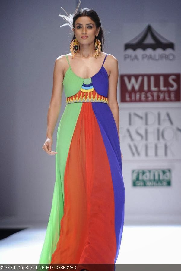 A model showcase a creation by fashion designer Pia Pauro on Day 2 of Wills Lifestyle India Fashion Week (WIFW) Spring/Summer 2014, held in Delhi.